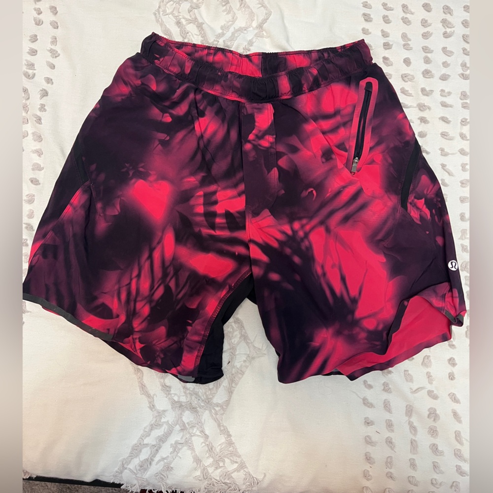 Lululemon vintage pink and Black Athletic Shorts medium.